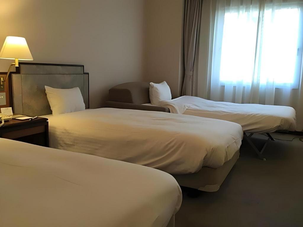 Hotel New Omi Omihacsiman Kültér fotó