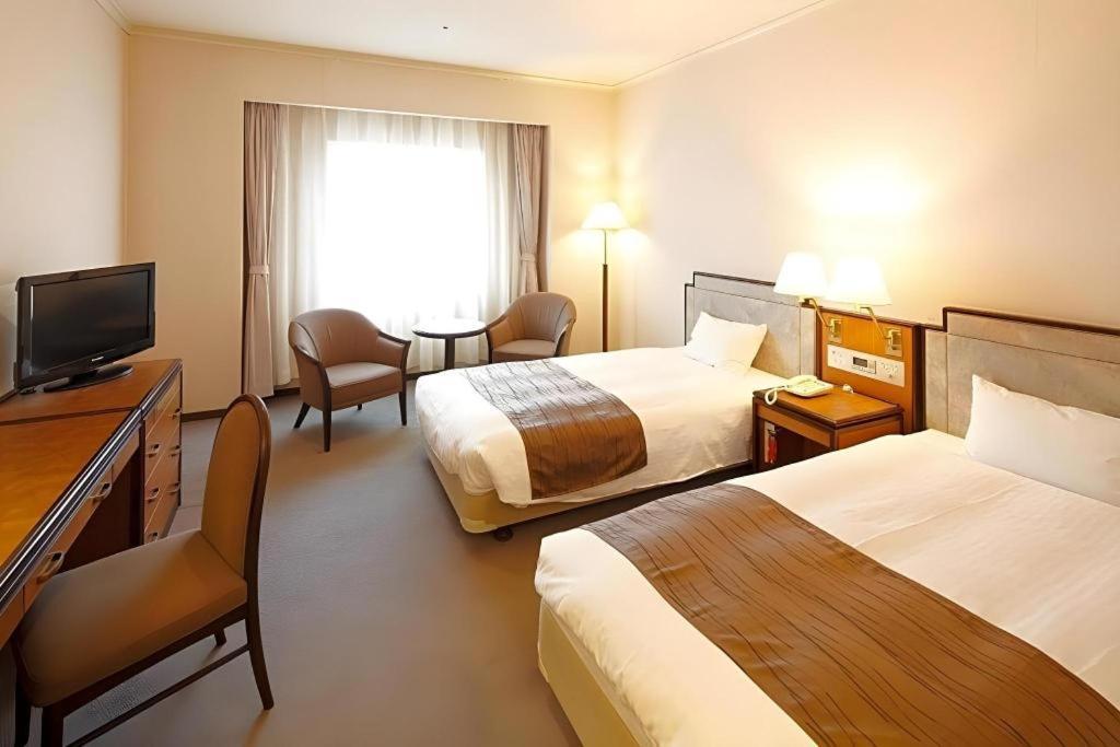 Hotel New Omi Omihacsiman Kültér fotó