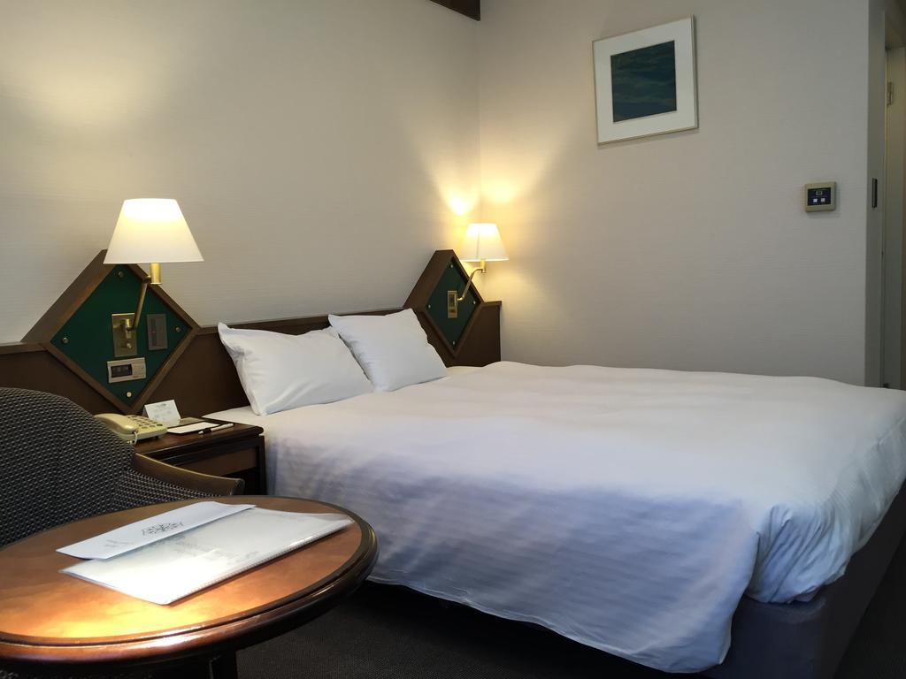 Hotel New Omi Omihacsiman Szoba fotó
