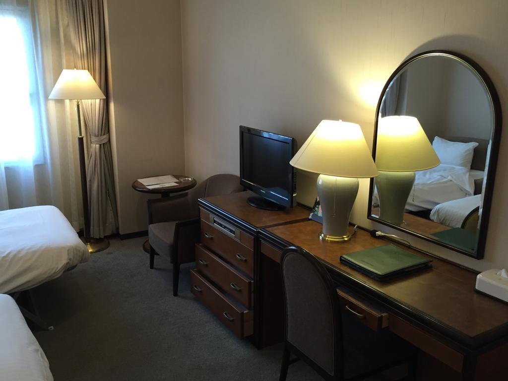 Hotel New Omi Omihacsiman Szoba fotó