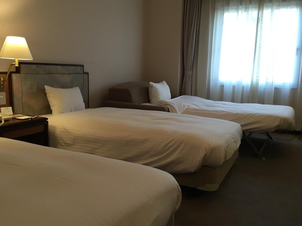 Hotel New Omi Omihacsiman Szoba fotó