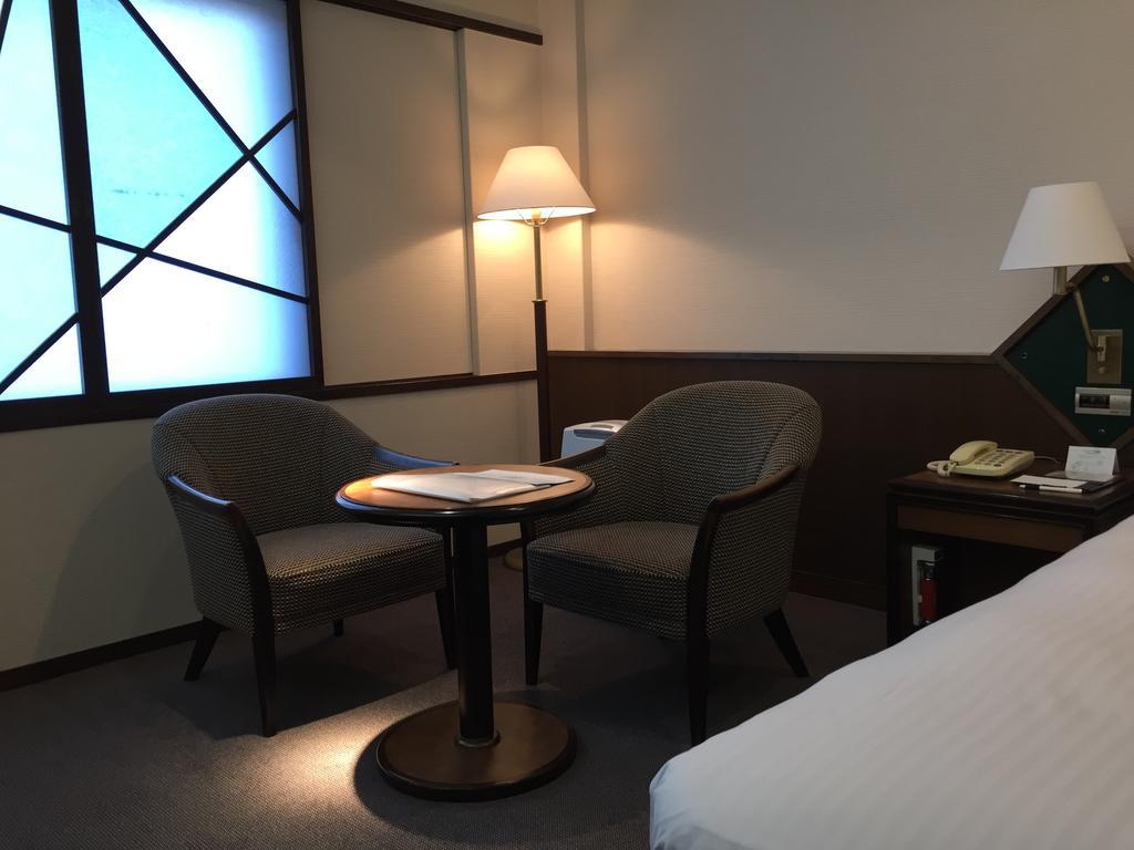 Hotel New Omi Omihacsiman Szoba fotó