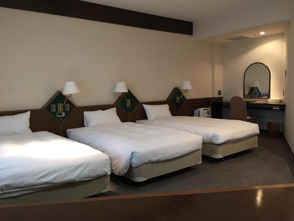 Hotel New Omi Omihacsiman Szoba fotó