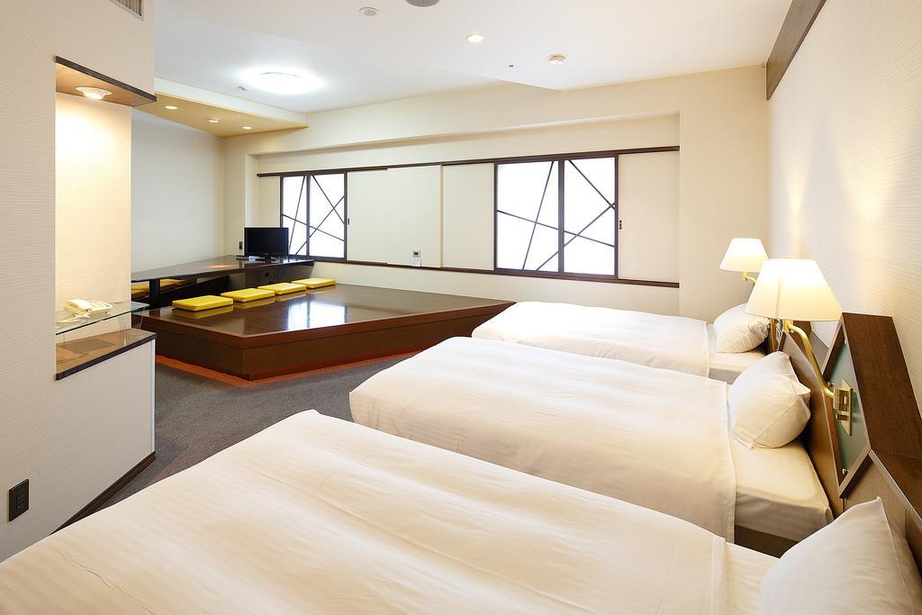 Hotel New Omi Omihacsiman Szoba fotó